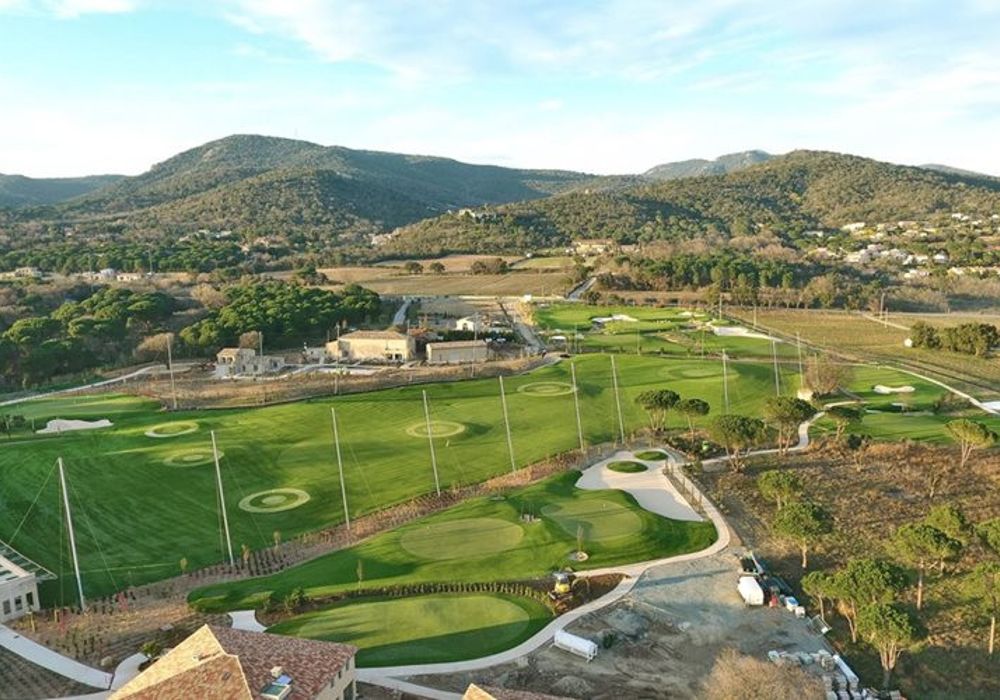 a high shot of a golf course using artificial turf
